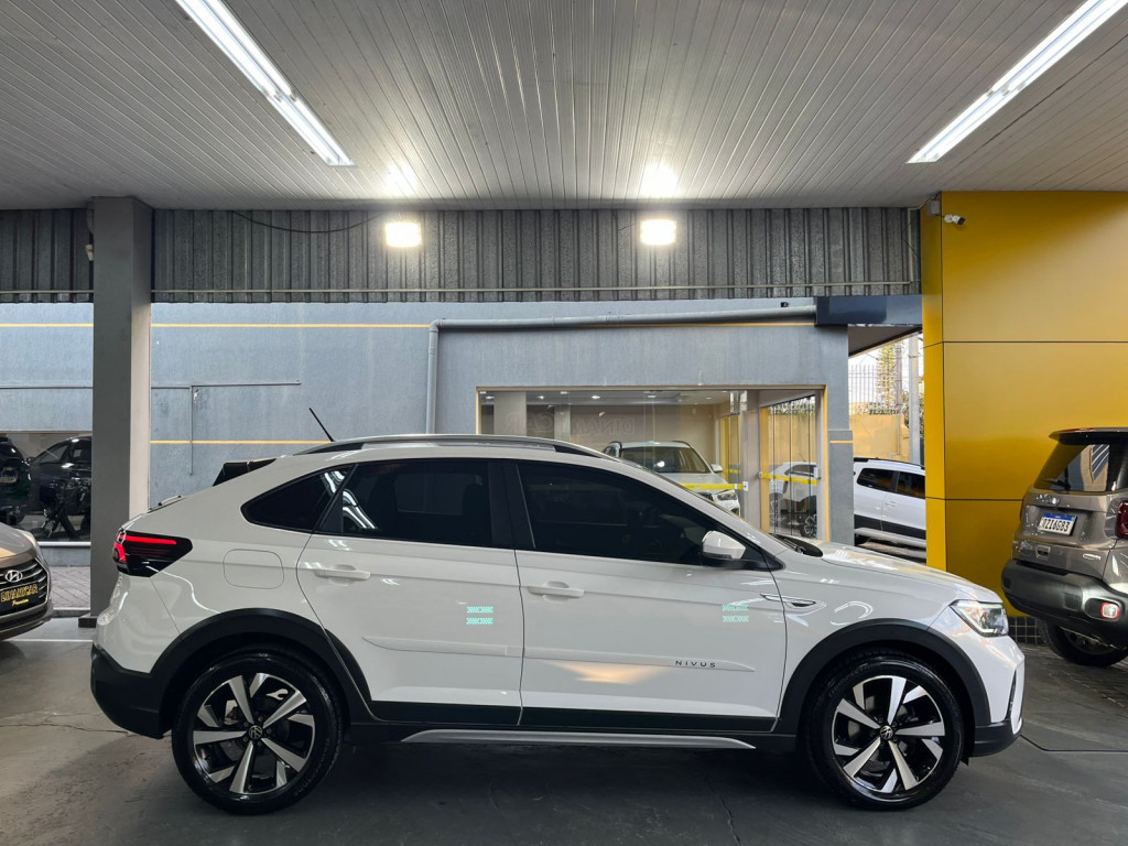 Imagem do veículo NIVUS 1.0 200 HIGHLINE AT! 52.000 KM! Ú.DONO! GARANTIA VW ATÉ 08/2026!